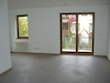 Wohnzimmer mit Balkon
